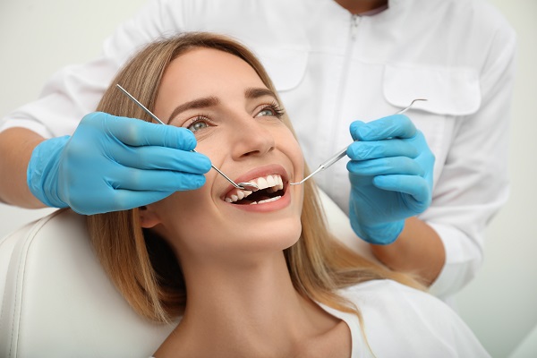 How A Cosmetic Dentist Can Boost Your Smile