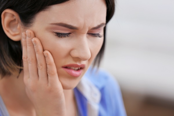 The Dental Health Risks Of Partially Erupted Wisdom Teeth